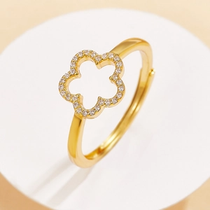 Elegant gold S925 silver adjustable ring with hollow clover design and cubic zirconia