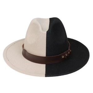 Detail of two-tone fedora hat with brown leather band and metallic rivet fasteners