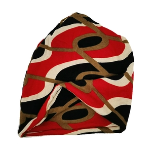 Winter thermal knit beanie hat with red and black abstract chain pattern for warmth