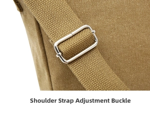 Close-up of durable canvas shoulder strap with adjustable silver metal buckle