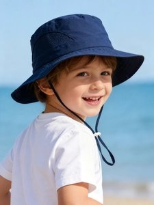 Detail of navy kids sun hat with breathable mesh panels and adjustable chin strap