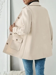 Elegant cream wool coat for women featuring a loose silhouette and classic flap pockets