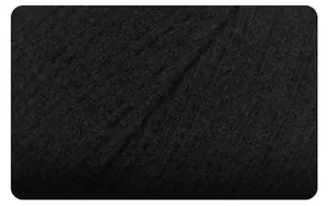 Macro shot of high-quality black knitted wool fabric with fine stitching and fiber texture
