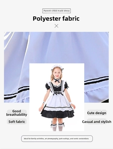 Detail of a black and white maid cosplay costume for girls with apron and lace headband