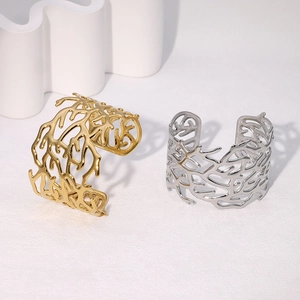 Vintage irregular hollow coral-style cuff bracelet in gold and silver stainless steel