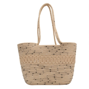 Large beige woven tote bag with wave patterns and speckled texture for summer beach vacation