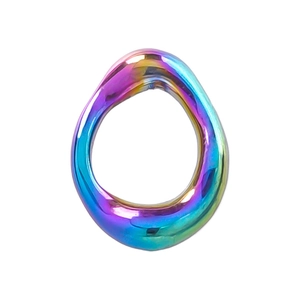 Macro detail of iridescent rainbow plating on irregular oval stainless steel DIY charm