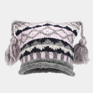 Fair Isle knit beanie with colorful geometric patterns, earflaps and tassel details