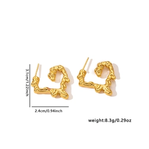 Detail view of gold fluid irregular earrings showing size dimensions 3.1cm and 8.3g weight