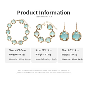 Detailed set of gold resin vintage necklaces with bracelets and earrings on white background