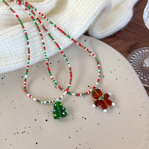 Charming beaded Christmas necklaces with cute Christmas tree and gingerbread man pendants