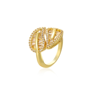 Fashionable gold leaf open ring with sparkling cubic zirconia on a white background