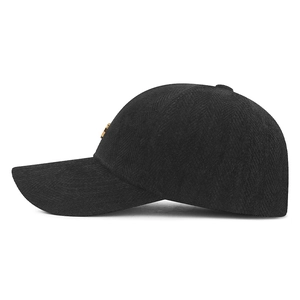 Black herringbone baseball cap with gold metal logo shown from a profile side view