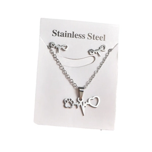 Stainless steel jewelry set with heart and paw print pattern on white display card