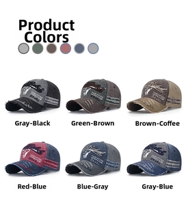 Detailed close-up of vintage washed baseball caps with distressed edges and embroidery
