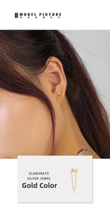 Detailed view of gold-plated 925 silver flower zircon chain tassel earrings