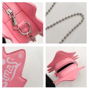 Détails du sac étoile rose avec bandoulière chaîne argentée, zip et motifs flocons de neige