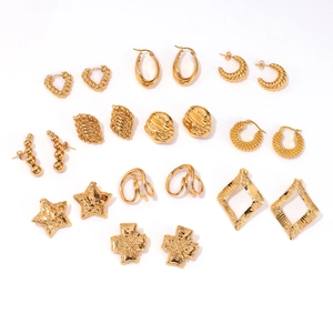 Set of gold stainless steel hoop and stud earrings in star, heart, and twist styles