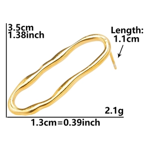 Macro view of gold wavy geometric stainless steel earring with precise size annotations