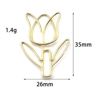 Detailed view of a gold tulip-shaped paperclip showing 35x26mm dimensions and metal texture