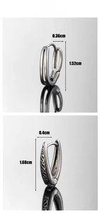 Detail view of V-shaped steel hoop earrings with engraved textures and size measurements
