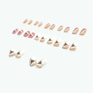 Press-on nails set with minimalist nude, brown, and white geometric abstract patterns