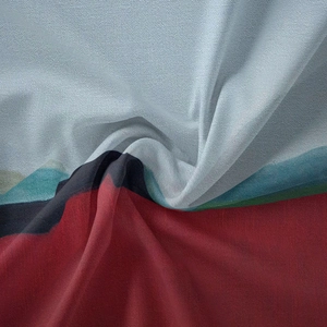 Detailed macro view of the colorful bohemian tapestry showing soft textured fabric folds