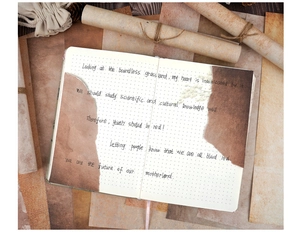 Macro detail of vintage brown torn decorative paper on a dot matrix notebook page