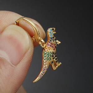 Golden dinosaur earrings with rainbow cubic zirconia pave on a polished gold hoop