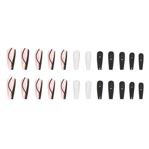 Faux ongles ballerine noirs et blancs avec motifs de vagues et strass sur fond blanc