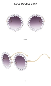 Detail view of round sunglasses featuring luxury pearl-embellished frames and golden wavy temples