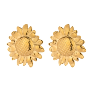 Detail of sunflower gold stud earrings with intricate petal texture and engraved center