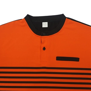 Detail of orange striped polo shirt collar, buttons and chest pocket texture