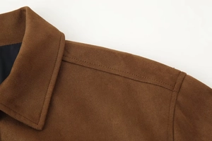 Detail of brown faux suede jacket showing high-quality stitching on collar and shoulder