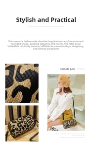 Detail view of the cylinder shoulder bag's leopard print texture and metal zipper closure