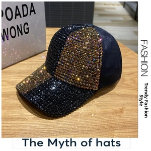 Detailed view of handmade black baseball cap featuring geometric diamond pattern and rhinestones