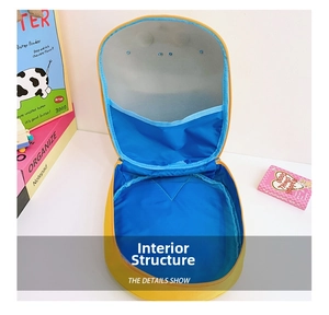 Internal structure of yellow hardshell children's backpack with blue elastic compartment