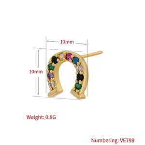 Minimalist horseshoe stud earrings with colorful pavé crystals in gold plating