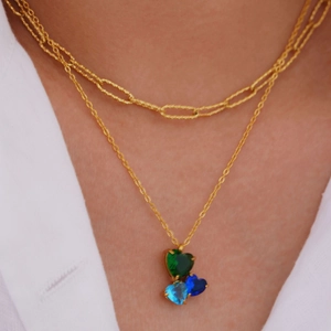Double layer 14k gold plated heart necklace with zircon stones on female model