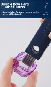 Detail of double-row stiff bristle gap brush cleaning a bottle lid crevice
