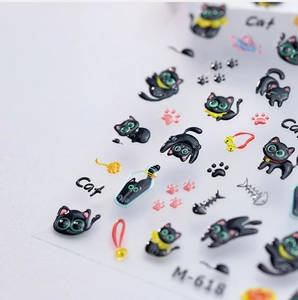 Gros plan d'autocollants 5D de chat noir et de pattes roses pour le nail art M-618
