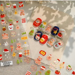5D embossed Christmas nail stickers featuring cute bears and holiday relief details