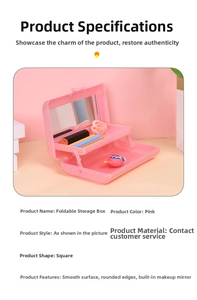 Detail of pink double-layer folding makeup box with built-in mirror and tray compartments