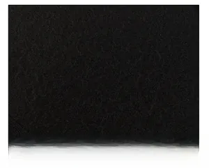Close-up of black wool fabric texture and adjustable buckle on middle-aged winter cap