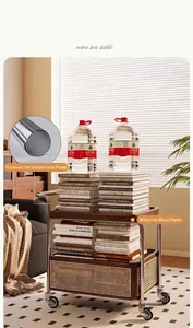 Detail of solid wood storage cart with stainless steel frame showing heavy load capacity