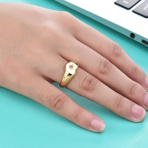 Fashionable 18K gold stainless steel heart signet ring with starburst diamond setting