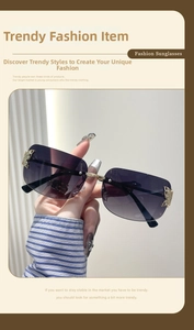 Detail of gradient purple rimless sunglasses with rhinestone butterfly metal accents