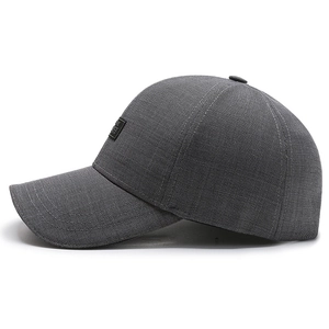 Dark grey breathable sports baseball cap with side logo and reinforced stitched brim