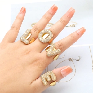 Gold-plated LOVE letter ring set for women with shimmering zircon stones and open design