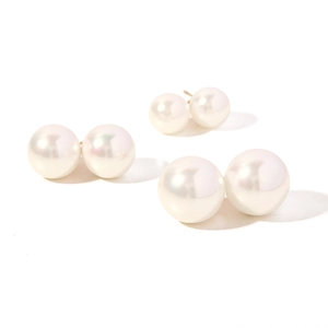 Three pairs of elegant iridescent white pearl stud earrings in varied sizes on white background